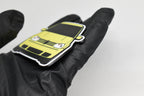 Side angle view showing 3D layered detail of yellow Volkswagen MK4 GTI keychain by LayerPlay Pocket Motors