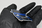Side angle view showing 3D layered detail of blue Volkswagen MK5 Golf R32 keychain by LayerPlay Pocket Motors