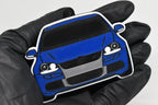 3D printed blue Volkswagen MK5 Golf R32 keychain held in hand, front view detail by LayerPlay Pocket Motors