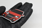 Side angle view showing 3D layered detail of red Volkswagen MK5 GTI keychain by LayerPlay Pocket Motors