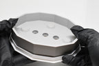 Hands in black gloves holding a 3D printed grey and white geometric octagonal ElevateFlow soap dish by LayerPlay Solara