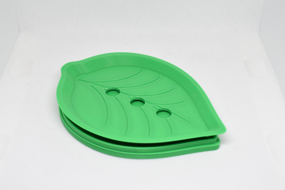 Solara Series FloraDrain Soap Dish, a 3D‑printed leaf‑shaped dish with drainage holes and embossed vein detailing, displayed on a white background.