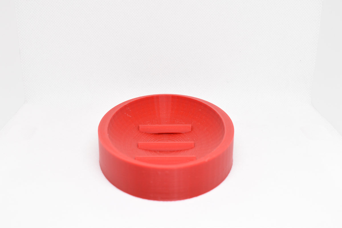 Front studio perspective view of 3D printed red oval soap tray showing basin rim by LayerPlay Solara