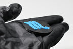 Side angle view showing raised 3D blue scorpio sign detail and thickness on black disc keychain by LayerPlay
